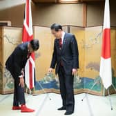 Rishi Sunak shows off his socks to Japanese Prime Minister Fumio Kishida during their bilateral meeting in Hiroshima ahead of the G7 Summit (Picture: Stefan Rousseau/WPA Pool/Getty Images)