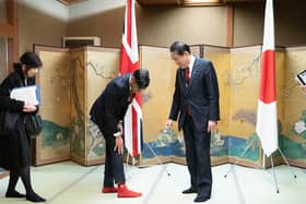 Rishi Sunak shows off his socks to Japanese Prime Minister Fumio Kishida during their bilateral meeting in Hiroshima ahead of the G7 Summit (Picture: Stefan Rousseau/WPA Pool/Getty Images)