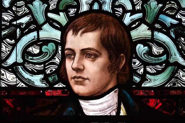 A picture of Robert Burns in a stained-glass window at Glasgow University's Bute Hall (Picture: John Devlin)