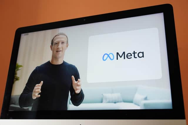 Seen on the screen of a device in Sausalito, Calif., Facebook CEO Mark Zuckerberg announces their new name, Meta, during a virtual event on Thursday, Oct. 28, 2021. Zuckerberg talked up his latest passion -- creating a virtual reality "metaverse" for business, entertainment and meaningful social interactions. (AP Photo/Eric Risberg)