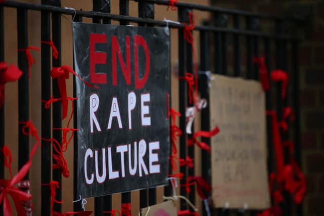 Ribbons have been used to tie 'End Rape Culture' signs outside James Allen's Girls' School in protest against 'rape culture', the red ribbons are to represent each 'abuse survivor' at the school. Several other London schools faced similar allegations following an online campaign called "Everyone's Invited" (Picture: Getty Images)
