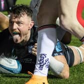 Glasgow Warriors' Jack Dempsey celebrates after scoring a second half try during the URC win over Ulster at Scotstoun. (Photo by Craig Williamson / SNS Group)