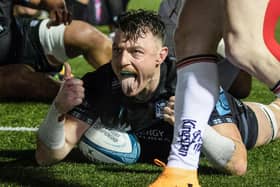 Glasgow Warriors' Jack Dempsey celebrates after scoring a second half try during the URC win over Ulster at Scotstoun. (Photo by Craig Williamson / SNS Group)