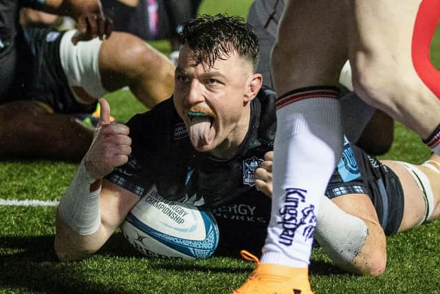 Glasgow Warriors' Jack Dempsey celebrates after scoring a second half try during the URC win over Ulster at Scotstoun. (Photo by Craig Williamson / SNS Group)