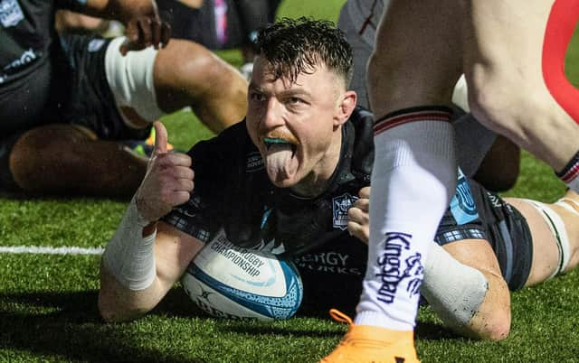 Glasgow Warriors' Jack Dempsey celebrates after scoring a second half try during the URC win over Ulster at Scotstoun. (Photo by Craig Williamson / SNS Group)