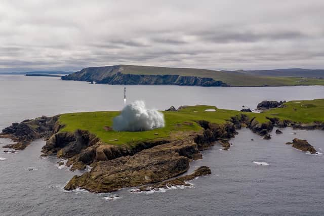 Computer generated image (CGI) issued by SaxaVord UK spaceport of a rocket taking off from Lamba Ness in Unst. Picture: PA