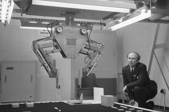 Professor David Michie with a robot developed in the Department of Machine Intelligence at Edinburgh University in June 1973