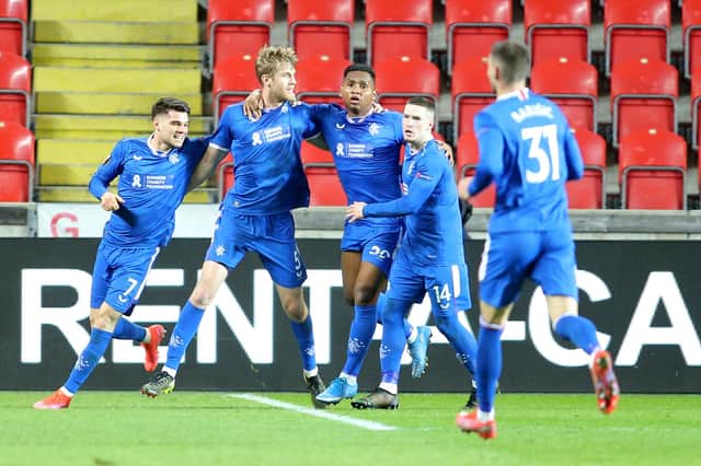 Rangers players celebrate Filip Helander's equaliser in the 1-1 draw against Slavia Prague in the first leg of their Europa League round of 16 tie. (Photo by MILAN KAMMERMAYER/AFP via Getty Images)