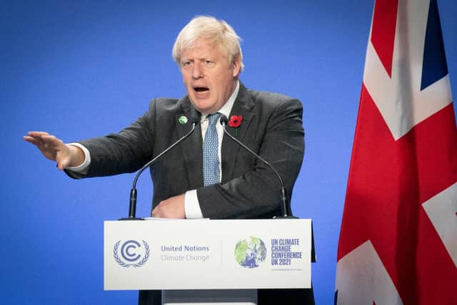 Prime Minister Boris Johnson speaking at a press conference during the Cop26 summit at the Scottish Event Campus (SEC) in Glasgow.