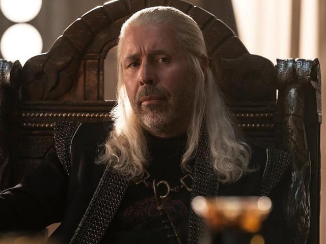 King Viserys I Targaryen (Paddy Considine) is the fifth Targaryen king on the Iron Throne, and his peaceful reign sows the seeds for war. His children include Rhaenyra with his first wife Aemma Arryn.