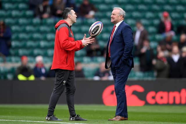 Wales assistant Stephen Jones, left, talks to head coach Wayne Pivac. The pair are trying to halt a losing run which has extended to four matches. Picture: Shaun Botterill/Getty Images