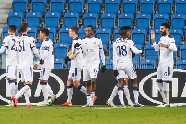 The Rangers players celebrate Ianis Hagi's goal against Lech Poznan