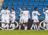 The Rangers players celebrate Ianis Hagi's goal against Lech Poznan