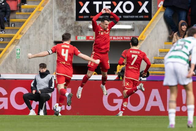 Aberdeen's Bojan Miovski celebrates after opening the scoring against Celtic. (Photo by Ross Parker / SNS Group)