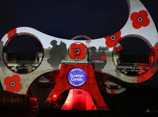 Poppies are projected onto the Falkirk Wheel as Scottish Canals and Poppy Scotland pay tribute on Armistice Day.