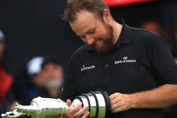 Shane Lowry gazes at the Claret Jug after his win the 148th Open at Royal Portrush in 2019. Picture: Andrew Redington/Getty Images.