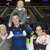 Glen Young and family after Edinburgh's win over Glasgow Warriors at Murrayfield on December 30. Young's form with Edinburgh has won him a Scotland recall. (Photo by Ross MacDonald / SNS Group)