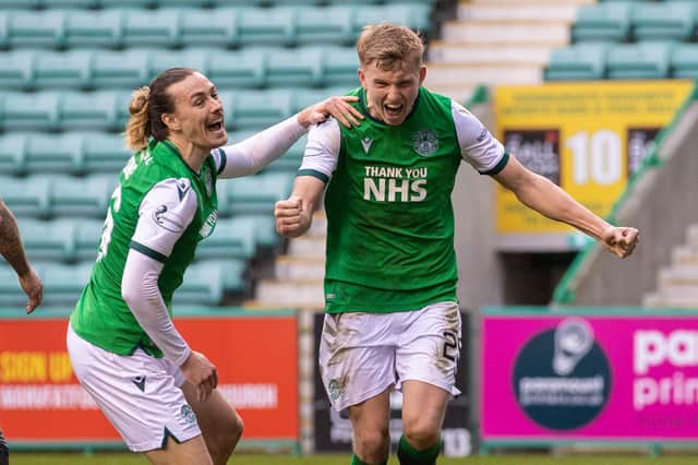 Hibs' Josh Doig shows his delight as he celebrates with team-mate Jackson Irvine after heading home his first senior goal for the club. Photo by Craig Williamson / SNS Group