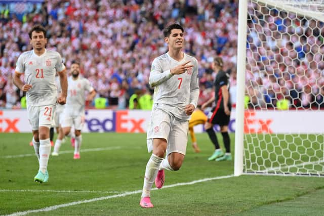 Alvaro Morata gestures to the crowd after scoring Spain's fourth goal in their dramatic 5-3 extra-time win over Croatia in the last 16 tie on Monday. (Photo by Stuart Franklin/Getty Images)