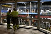 ​Workers survey the offline turbine hall in the UK’s last coal-fired power station (Picture: Darren Staples/AFP/Getty)