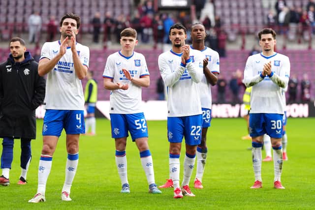 Rangers players applaud their fans after the 3-1 win over Hearts.