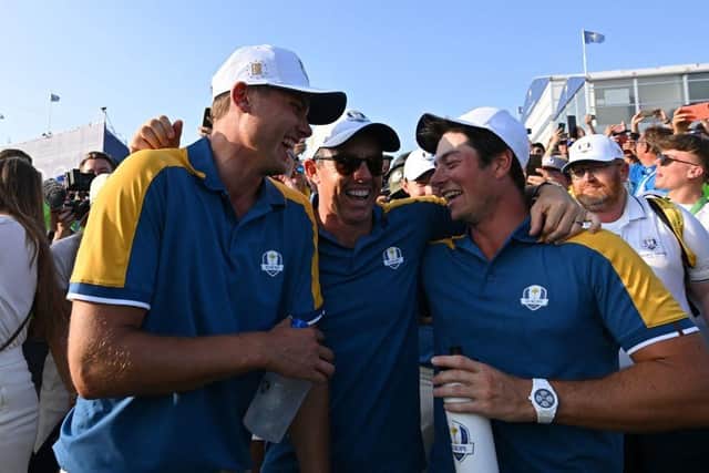 Ludvig Aberg and Viktor Hovland celebrate with Rory McIlroy celebrate after Europe's win in last year's Ryder Cup in Rome. Picture: Alberto Pizzoli/AFP via Getty Images.