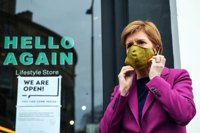 Nicola Sturgeon wears a face covering while campaigning in the Edinburgh Central constituency (Picture: Andy Buchanan/pool/Getty Images)