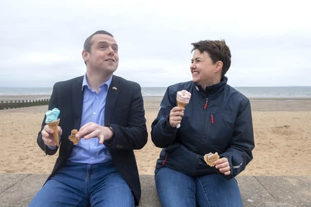 Scottish Conservative leader Douglas Ross (left) and former Scottish Conservative Leader Ruth Davidson stop to have an ice cream at Oscars during a visit to Portobello, Edinburgh