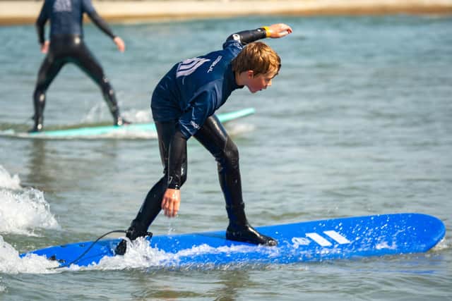 Kids surf free at Lost Shore Surf Resort this July