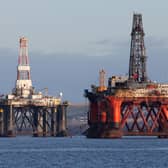 An oil platform standing amongst other rigs that have been left in the Cromarty Firth near Invergordon in the Highlands of Scotland.  Picture: Andrew Milligan/PA Wire