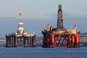 An oil platform standing amongst other rigs that have been left in the Cromarty Firth near Invergordon in the Highlands of Scotland.  Picture: Andrew Milligan/PA Wire