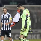 Aberdeen goalkeeper and captain Joe Lewis trudges off at full time.
