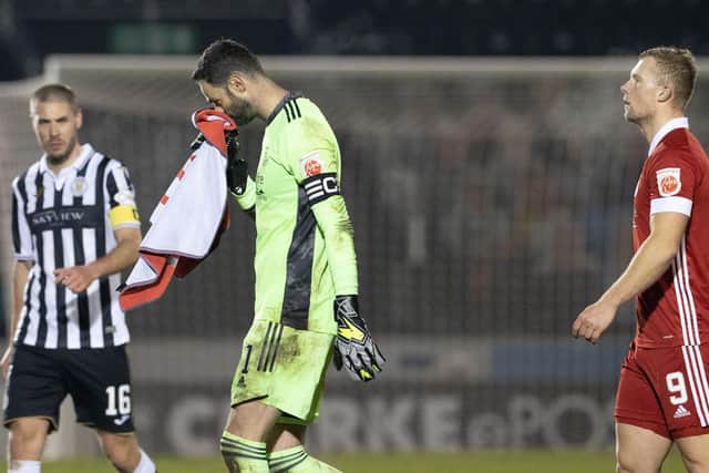 Aberdeen goalkeeper and captain Joe Lewis trudges off at full time.