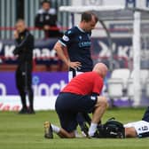 Dundee forward Danny Mullen was sent to hospital after injury his leg.