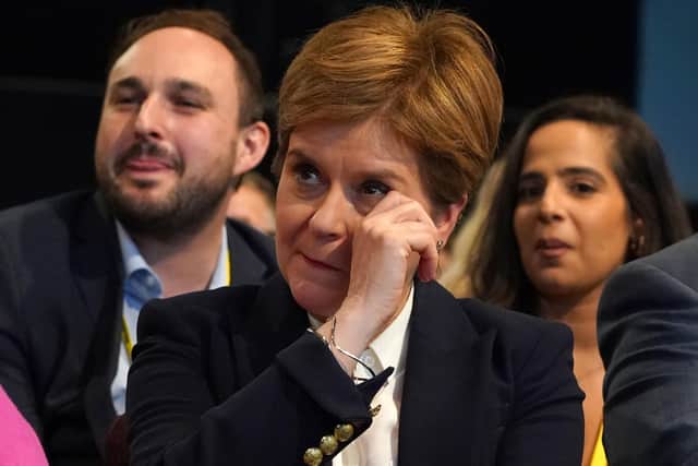Former leader Nicola Sturgeon in the conference hall as tributes to her are played on a screen to delegates at the SNP annual conference at the Event Complex Aberdeen (TECA). Picture: Andrew Milligan/PA Wire