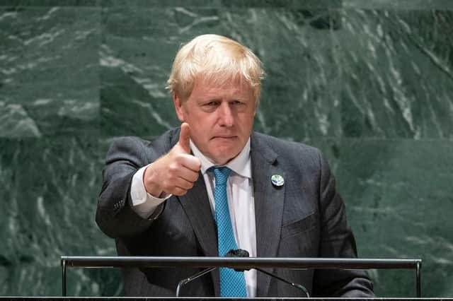 Boris Johnson gives a thumbs up as he speaks to the 76th session UN General Assembly about climate change (Picture: Eduardo Munoz/pool/AFP via Getty Images)