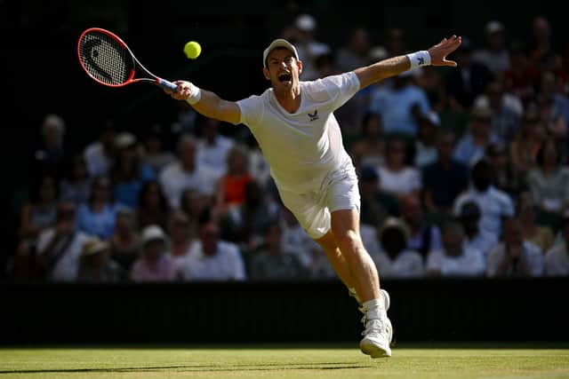 Andy Murray stretches for a forehand against Stefanos Tsitsipas during their second round clash on Centre Court at Wimbledon. (Photo by Shaun Botterill/Getty Images)