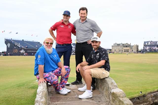 The winning team of John Daly, Louis Oosthuizen, Zach Johnson and Sir Nick Faldo pose for a photo on the Swilcan Bridge during the Celebration of Champions at St Andrews. Picture: Ross Kinnaird/Getty Images.