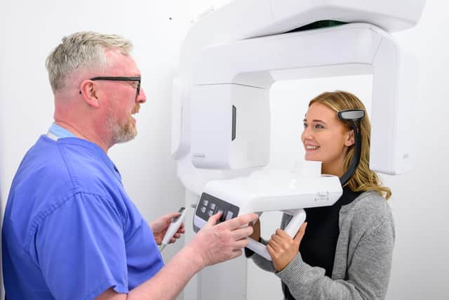 Dental cone beam CT (CBCT) scanner