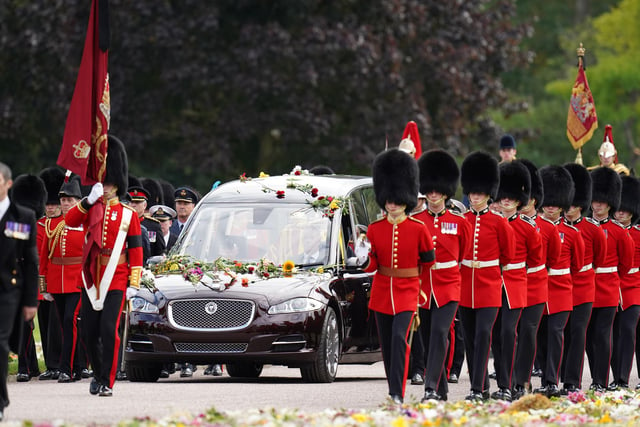 The Ceremonial Procession of the coffin of Queen Elizabeth II arrives at Windsor Castle for the Committal Service at St George's Chapel. Picture date: Monday September 19, 2022.