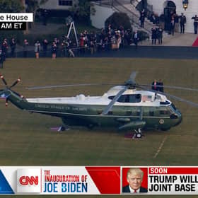 Pictured: CNN's live coverage of Inauguration Day captures the moment President Donald Trump exited the White House for the last time.