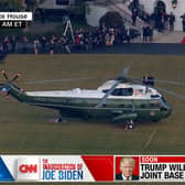 Pictured: CNN's live coverage of Inauguration Day captures the moment President Donald Trump exited the White House for the last time.