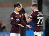 Yutaro Oda replaces Robert Snodgrass to make his Hearts debut after the home fans alerted him to the fact he was being summoned to the bench. (Photo by Ross Parker / SNS Group)