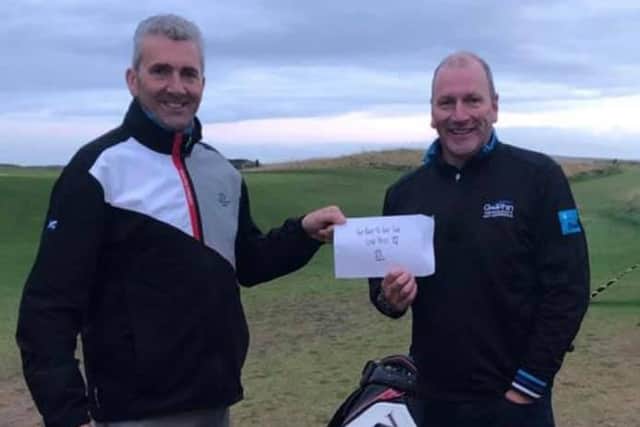 Alan Tait, right, is congratulated by David Scott, general manager at Dumbarnie Links, after winning the Get Back to Golf Tour final