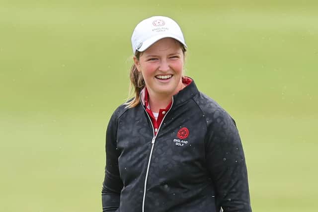 Lottie Woad smiles on her way to winning the Smyth Salver as leading amateur in the AIG Women's Open at St Andrews. Picture: Michael Reaves/Getty Images.