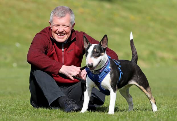 Scottish Liberal Democrat leader Willie Rennie meets Daisy an English bull terrier during a visit to the Edinburgh Dog and Cat Home while campaigning for the Scottish Parliamentary election.
