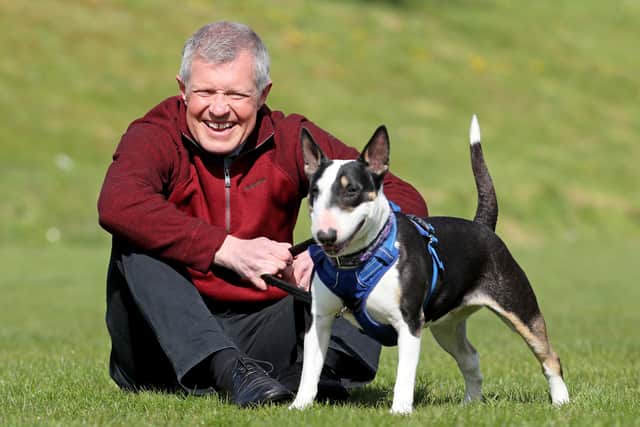 Scottish Liberal Democrat leader Willie Rennie meets Daisy an English bull terrier during a visit to the Edinburgh Dog and Cat Home while campaigning for the Scottish Parliamentary election.