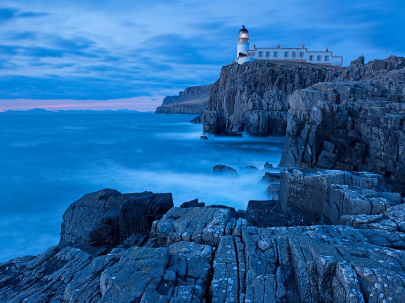 Neist Point lighthouse can be found on the most westerly tip of the Isle of Skye near Glendale. It is considered one of the most famous lighthouses in Scotland and it's recommended you visit at sunset when the red-golden rays ignite the scenery in an unforgettable display.
