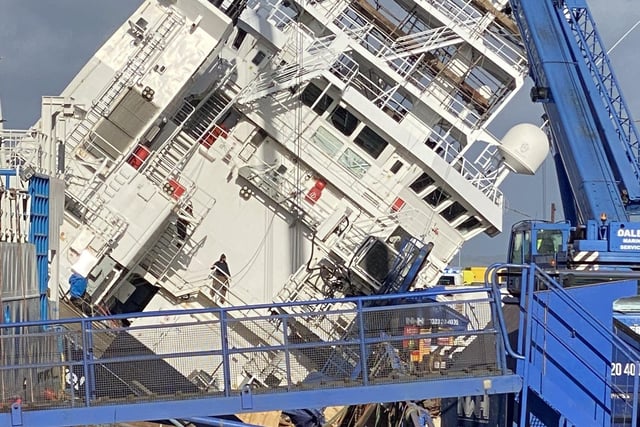 The vessel tilted at a 45-degree angle at Leith dock. Picture: @tomafc83 on Twitter