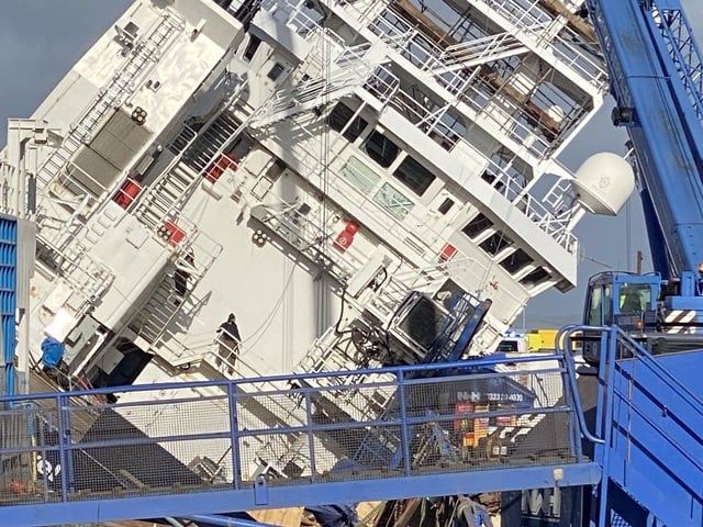 The vessel tilted at a 45-degree angle at Leith dock. Picture: @tomafc83 on Twitter